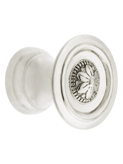 Small Flower Design Cabinet Knob - 1 inch Diameter in Polished Nickel.